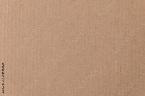 Brown cardboard sheet texture background. Texture of recycle paper box in old vintage pattern background.