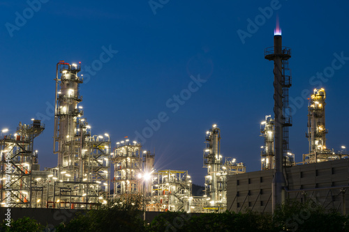 Oil refinery factory in twilight  petrochemical plant