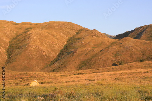Tent in the field, mountains area
