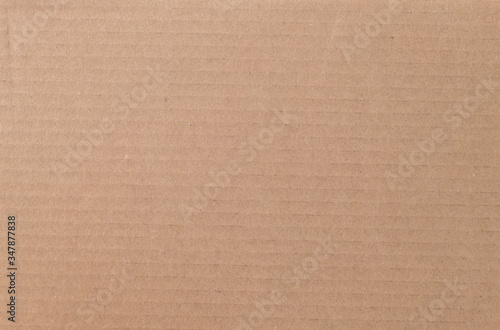 Brown cardboard sheet texture background. Texture of recycle paper box in old vintage pattern background.
