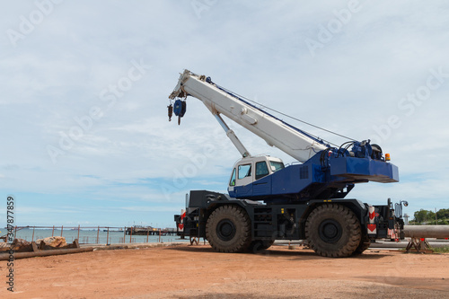 Mobile crane is waiting work at harbor