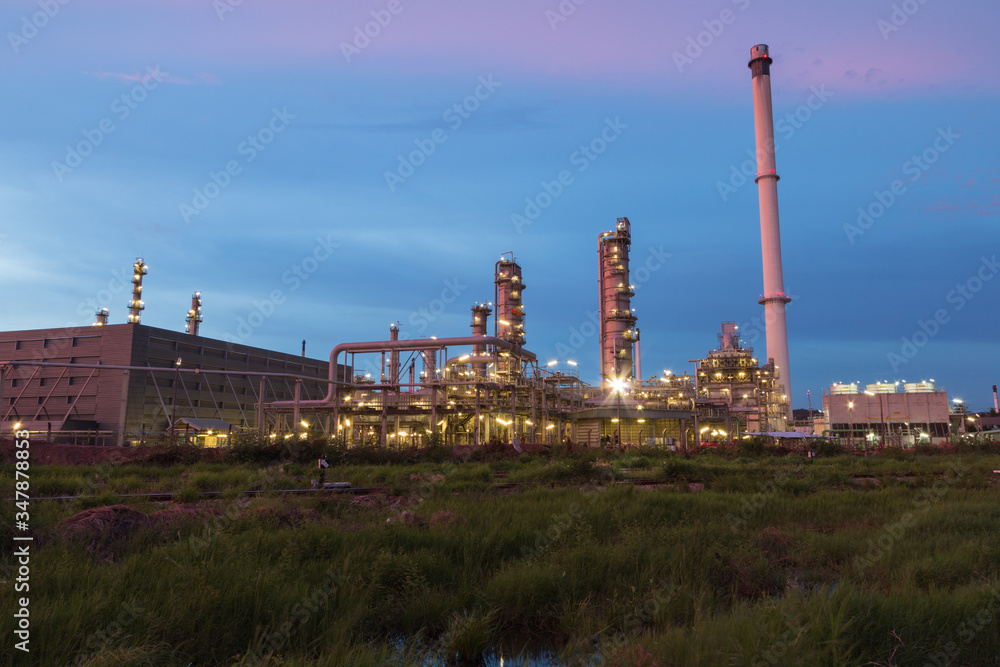 Oil Refinery factory in evening, Petroleum, petrochemical plant Oil Refinery factory in evening, Petroleum, petrochemical plant