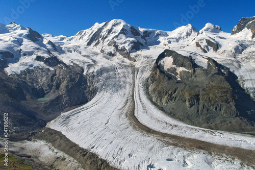 Glacier in Swiss Alps, snow and ice, beautiful alpine landscape of summer in mountains, Zermatt, Switzerland 