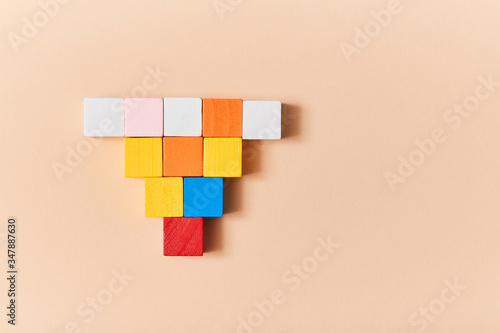 Empty wooden cubes mockup, copy space. Template with colourful blocks for creative design. Isolated on peach background