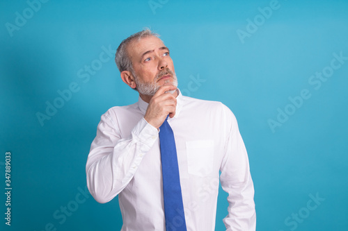 isolated business man with thinking or idea expression