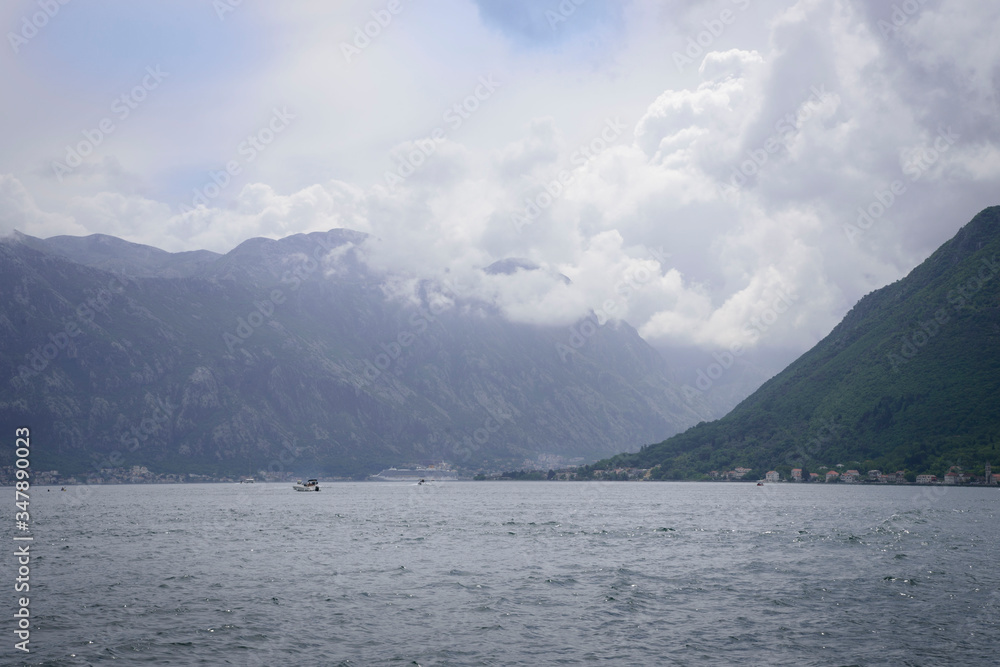 View from a sailing boat of the Kotor bay in the Adriatic, Montenegro, Europe.