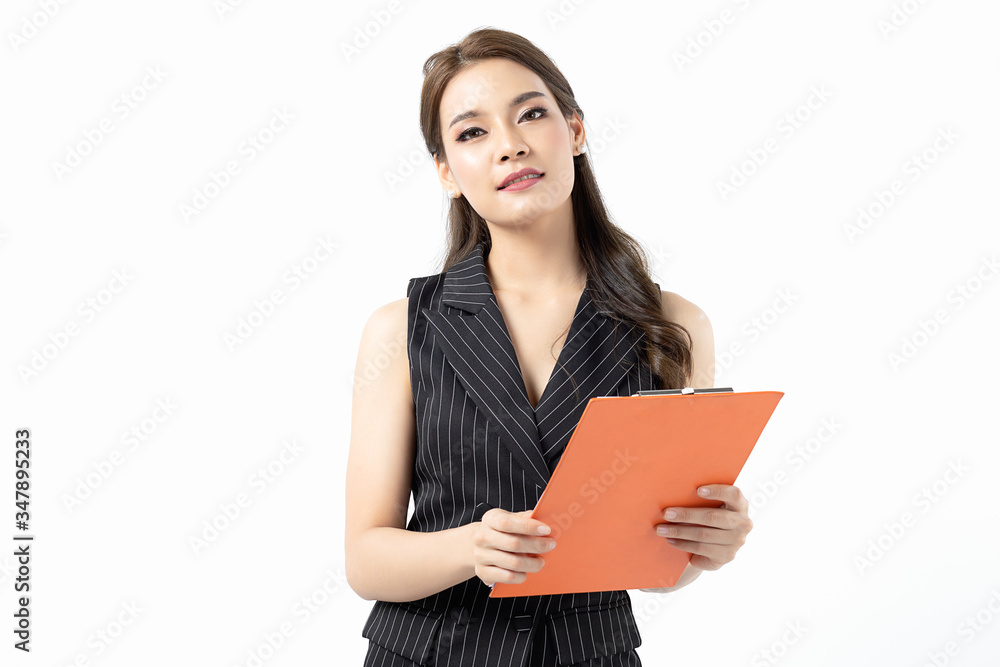 Portrait happy beautiful young asian business woman long hair standing and holding clipboard with looking to camera and smile over white background. With copy space for your text. Portrait happy beautiful young asian business woman long hair standing and holding clipboard with looking to camera and smile over white background. With copy space for your text.