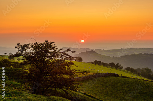 sunset over the hills © david