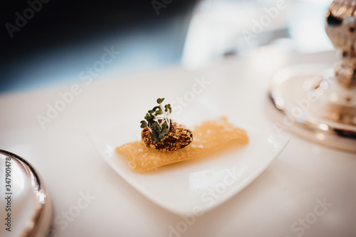 photo of a luxury artistic dish in a restaurant photo