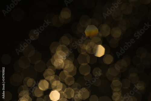 yellow glitter vintage lights background,bokeh background,defocused
