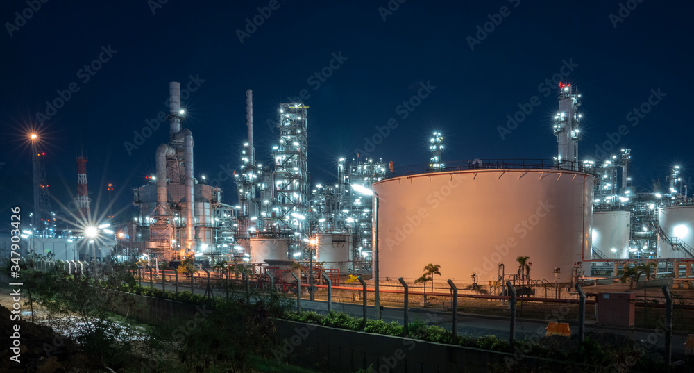 Aerial view by drone of oil petrochemical refinery plant during sunset