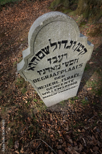 Jewish cemetry at Willemsoord. Thombstone. Graveyard. Maatschappij van Weldadigheid Frederiksoord Drenthe Netherlands.  photo