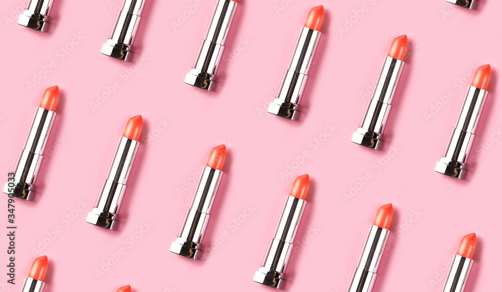 Pattern made from lipsticks on pink background. Pattern made from lipsticks on pink background.