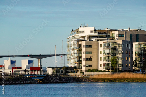 Kalmar, Sweden May 10, 2020 A modern redeveloped neighborhood by the sea called Varvsholmen and a view towards the Oland bridge. © Alexander