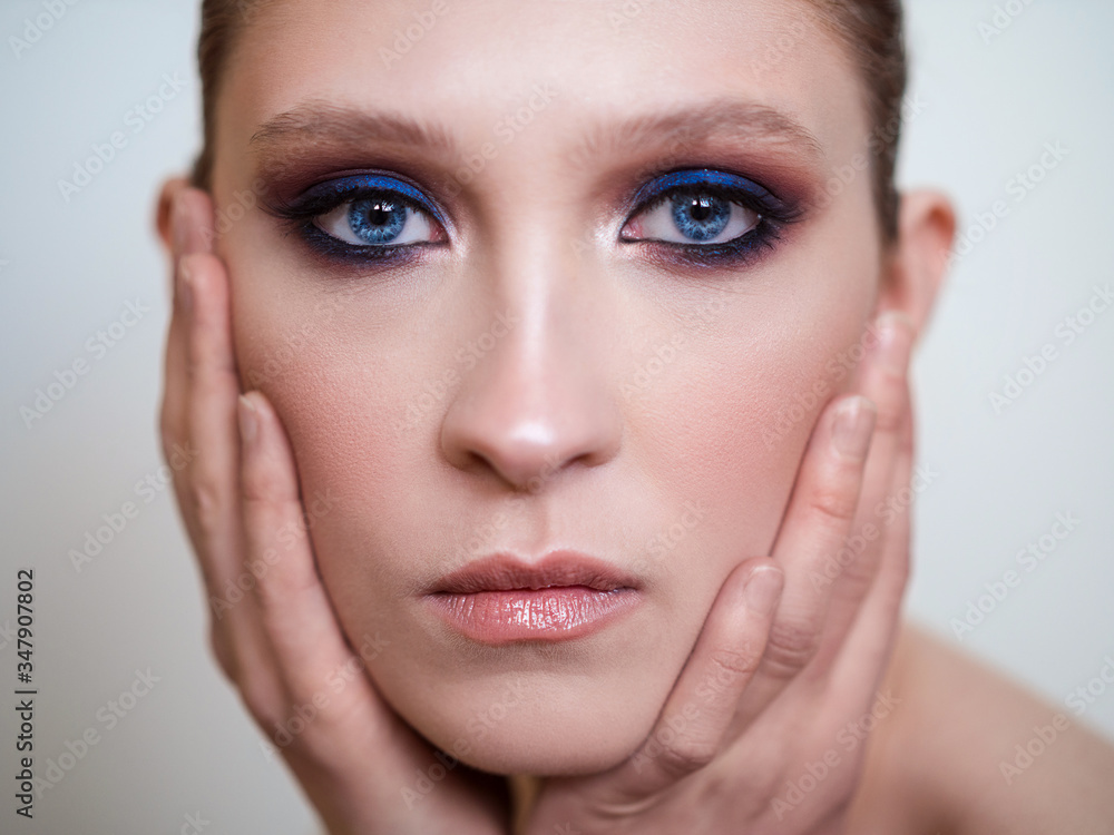 Beautiful woman model with stylish makeup. Glamour head shot. Beautiful woman model with stylish makeup. Glamour head shot.