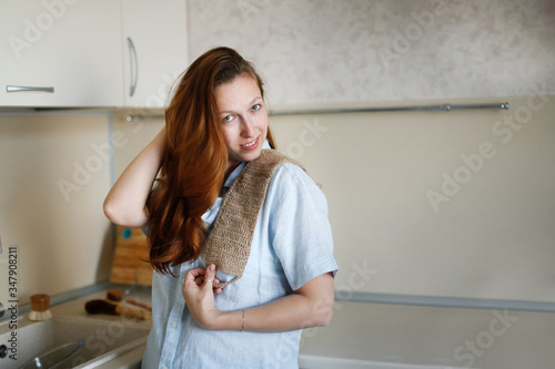 Caucasian woman with natural jute body washcloth