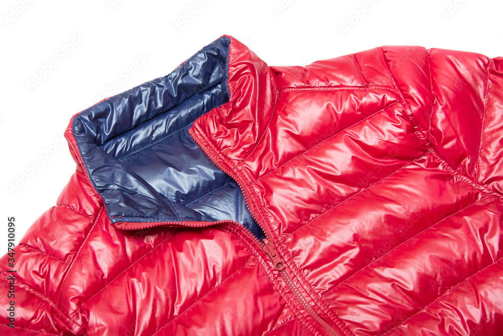 ฺBlue and red full zipper windbreaker down jacket, rain proof down jacket. Down jacket sport shiny nylon full zip isolated on white. 