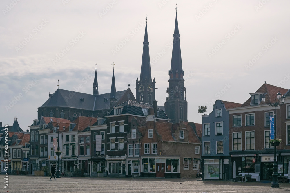 Detail of medieval skyline with towers churches in historic city center of Delft, Netherlands. Travel or tourist abstract  cityscape. 