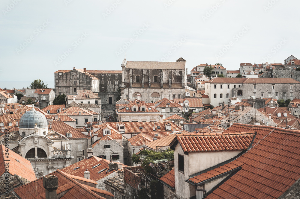 The old town in Dubrovnik Croatia. View from walls around Dubrovnik in Croatia. Very atmospheric photo. Generic view over the town and rooftops.