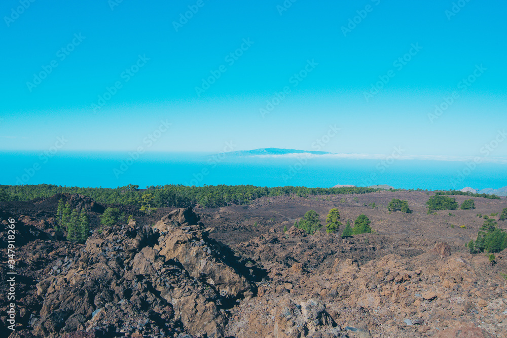 Tenerife landscape view over Teide volcano in the Canary Islands. Eruption background photo. Tenerife landscape view over Teide volcano in the Canary Islands. Eruption background photo.