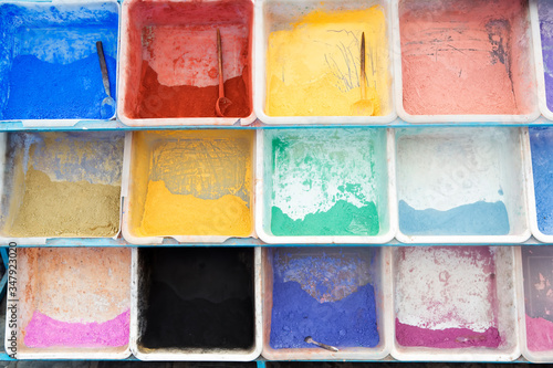 Colourful powdered pigments, Chefchouen, Morocco   photo