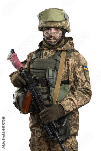 Ukraine officer in mechanized infantry uniform isolated with clipping path on white background. (Flag and arms of Ukraine on the shoulder. Patch on the chest with the inscription Ukraine in Ukrainian)