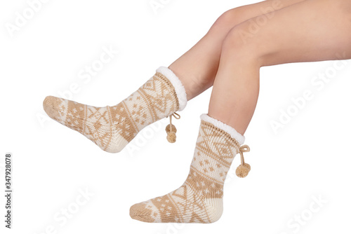 Women's brown sherpa winter socks with legs on white background