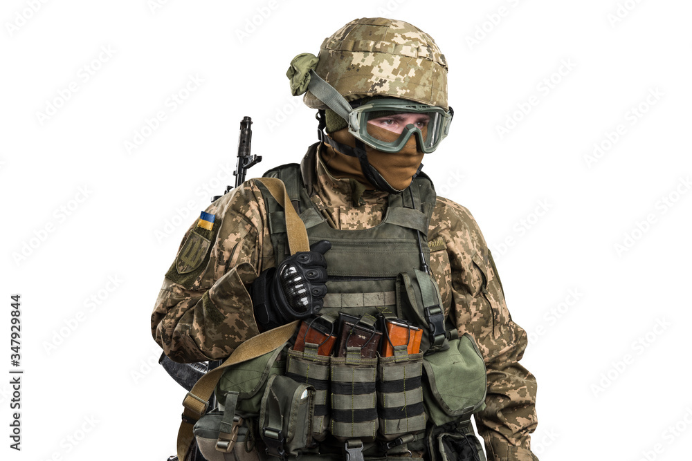 Ukraine officer in mechanized infantry uniform isolated with clipping path on white background. (Flag and arms of Ukraine on the shoulder. Patch on the chest with the inscription Ukraine in Ukrainian) Ukraine officer in mechanized infantry uniform isolated with clipping path on white background. (Flag and arms of Ukraine on the shoulder. Patch on the chest with the inscription Ukraine in Ukrainian)