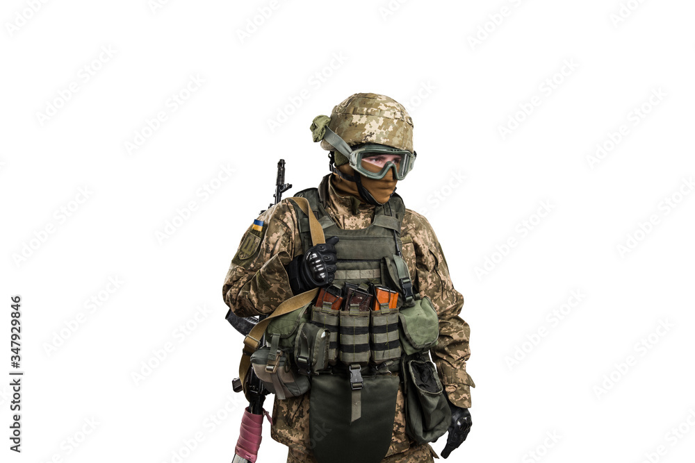 Ukraine officer in mechanized infantry uniform isolated with clipping path on white background. (Flag and arms of Ukraine on the shoulder. Patch on the chest with the inscription Ukraine in Ukrainian) Ukraine officer in mechanized infantry uniform isolated with clipping path on white background. (Flag and arms of Ukraine on the shoulder. Patch on the chest with the inscription Ukraine in Ukrainian)