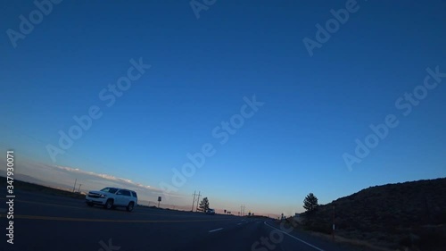 Driving on route 395 in the evening, near mono lake and lee vining, in California, USA. photo