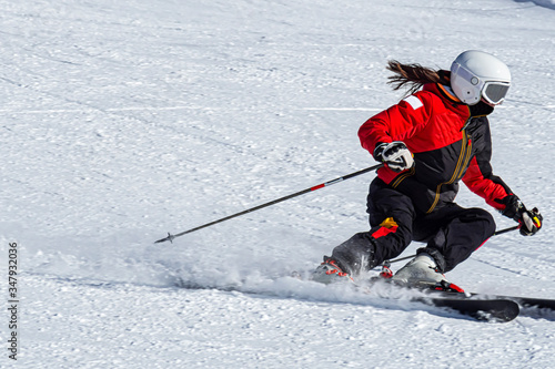 Close-up of a skier on a slope