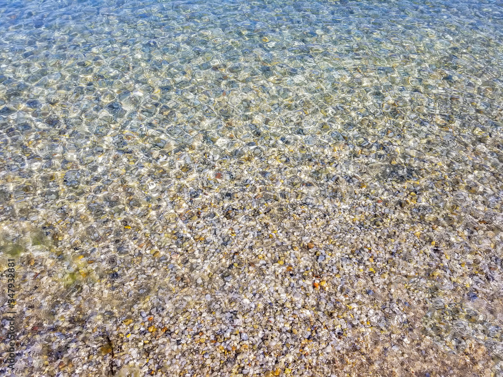 Transparent sea water on the beach
