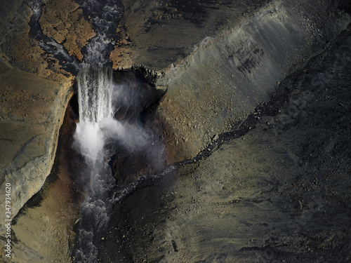 Aerial shot of unnamed waterfall in the highlands of Iceland photo