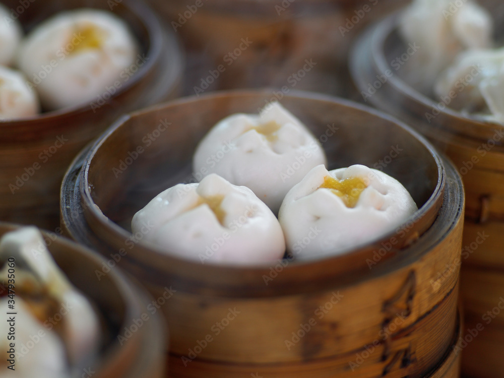 close up of steaming custard dumplings in China close up of steaming custard dumplings in China