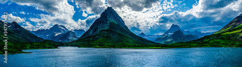 0000289_Panoramic scene of Grinnell Point at Swiftcurrent Lake near Many Glacier Hotel -  Glacier National Park__4961 photo
