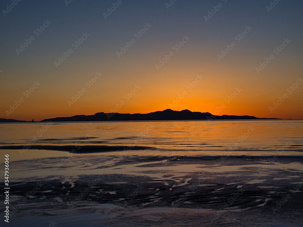Beautiful cloudless sunset from the shore of the great salt lake Beautiful cloudless sunset from the shore of the great salt lake