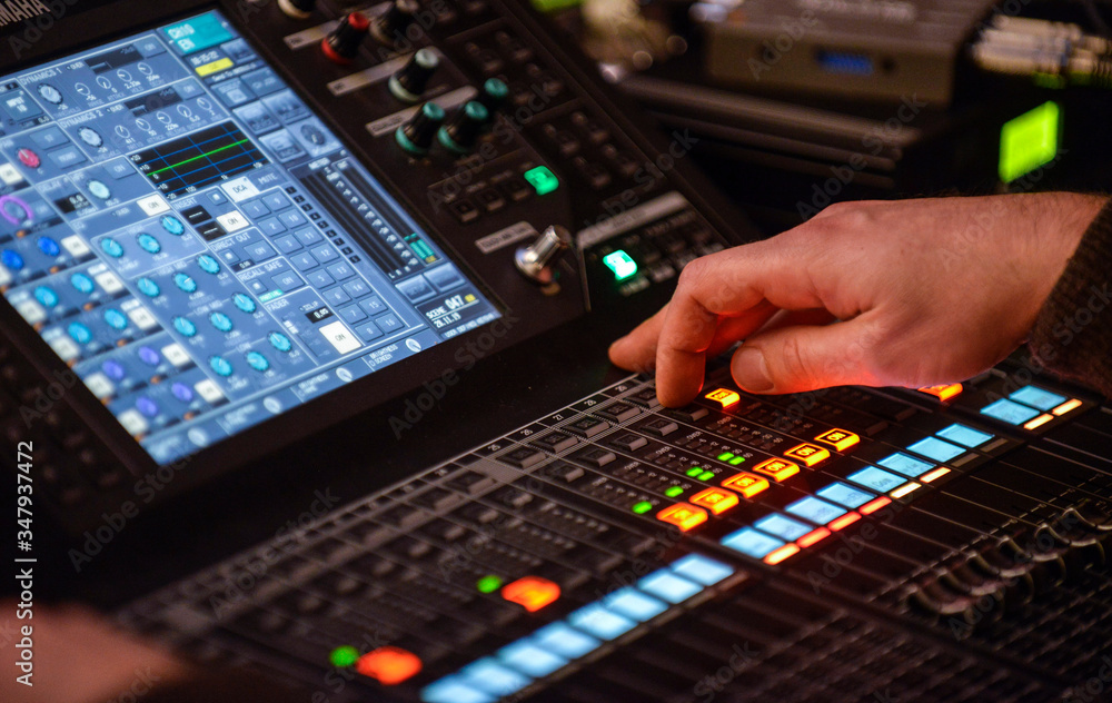 Sound engineer working in recording studio Sound engineer working in recording studio