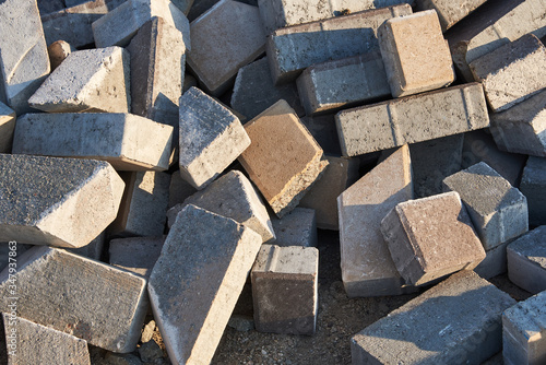 A pile of waste after laying paving slabs. Background © arostynov