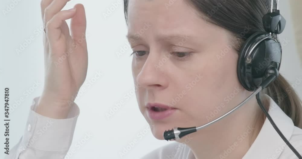 Angry woman yelling at opponent by headset. Crisis time in economic sphere. Annoyed expression.