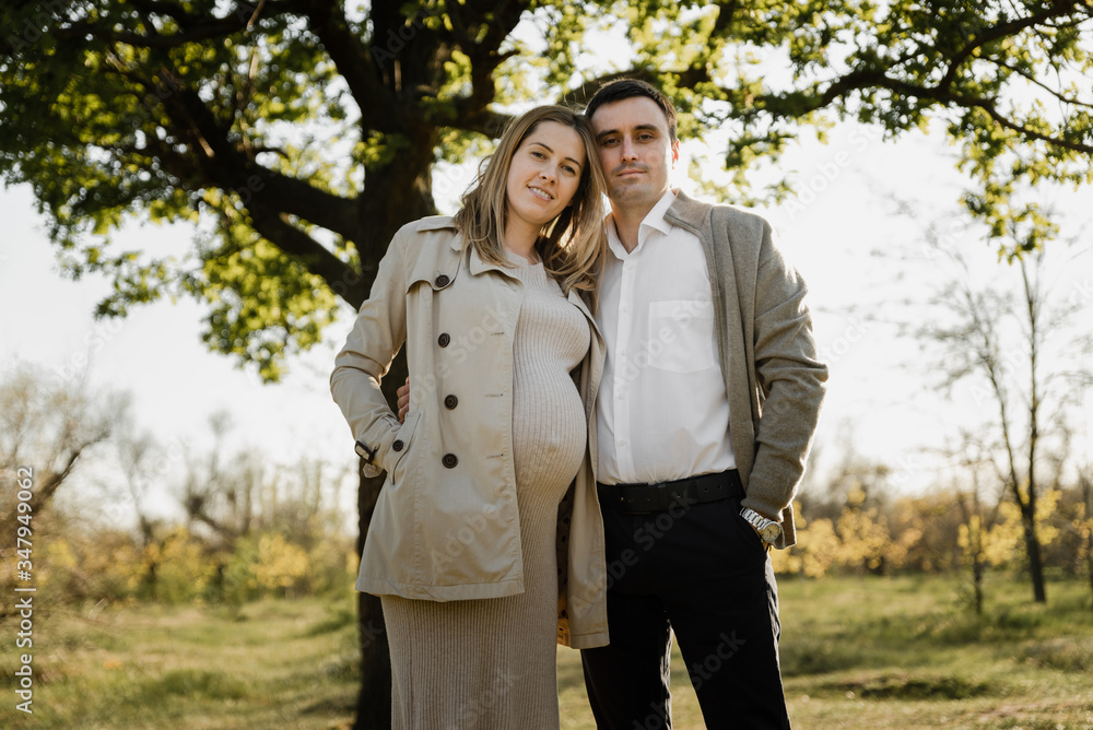 portrait of a pregnant couple,future parents,happy young family is pregnant portrait of a pregnant couple,future parents,happy young family is pregnant