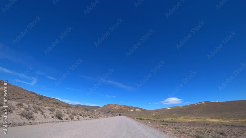 A view of driving along country road in California. Bodie State Historic Park. A view of driving along country road in California. Bodie State Historic Park.