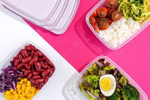 Homemade vegan food in lunch boxes with healthy vegetable fresh from above. Vegan food concept. Healthy food. Flat lay. Top view