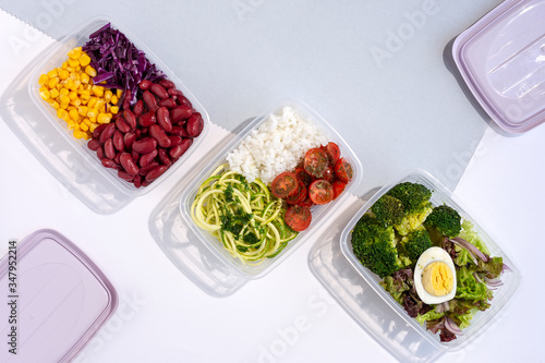 Homemade vegan food in lunch boxes with healthy vegetable fresh from above. Vegan food concept. Healthy food. Flat lay. Top view