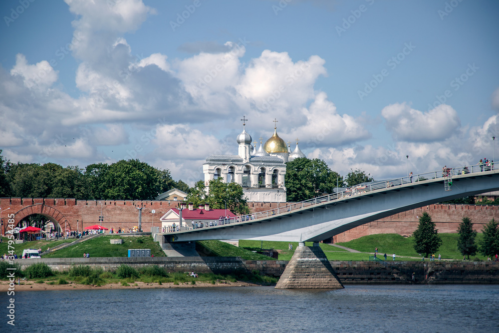 Beautiful view of the cathedral on the river bank. Kremlin in Veliky Novgorod. Belfry of the Sofia Cathedral. Christmas, Easter, Trinity. Orthodoxy.