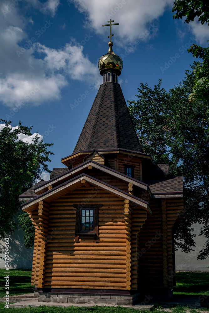 View of a small wooden chapel. Velikiy Novgorod. Christmas, Easter, Trinity. Orthodoxy.