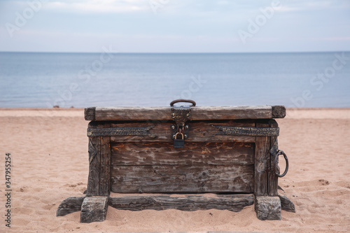 Pirate chest on the seashore. Treasure Island.