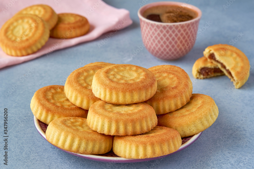 Traditional arabic eid sweets. Maamoul cookies with dates and coffee