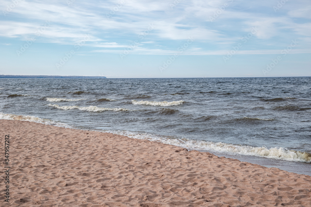 View of the sandy beach of the sea. Ladoga Lake Russia. View of the sandy beach of the sea. Ladoga Lake Russia.