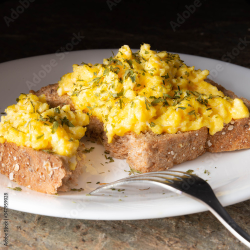 scrambled eggs on white plate