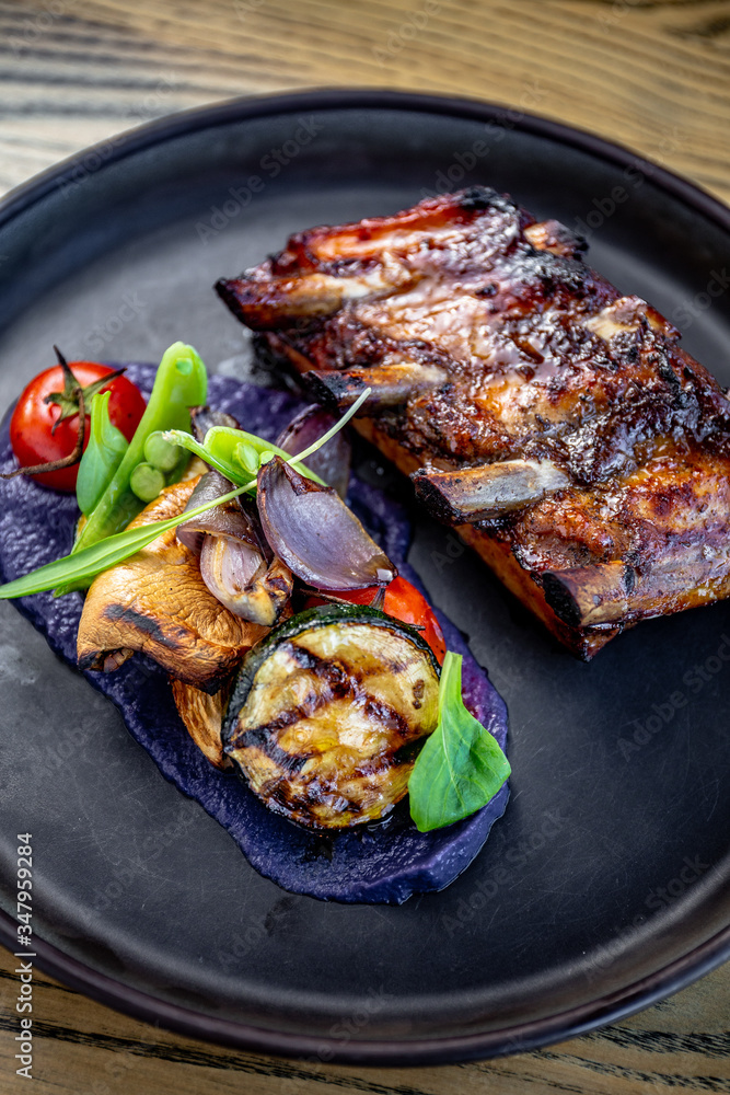 Grilled ribs with bbq sauce, purple potato purée